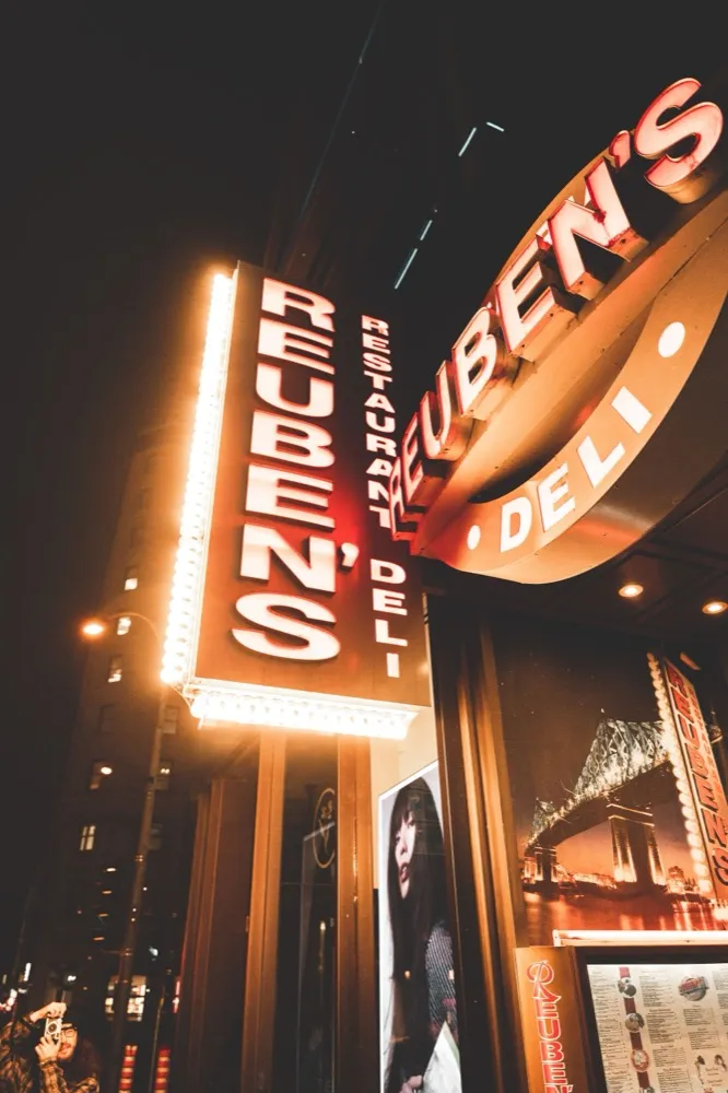 Illuminated storefront signage design at night